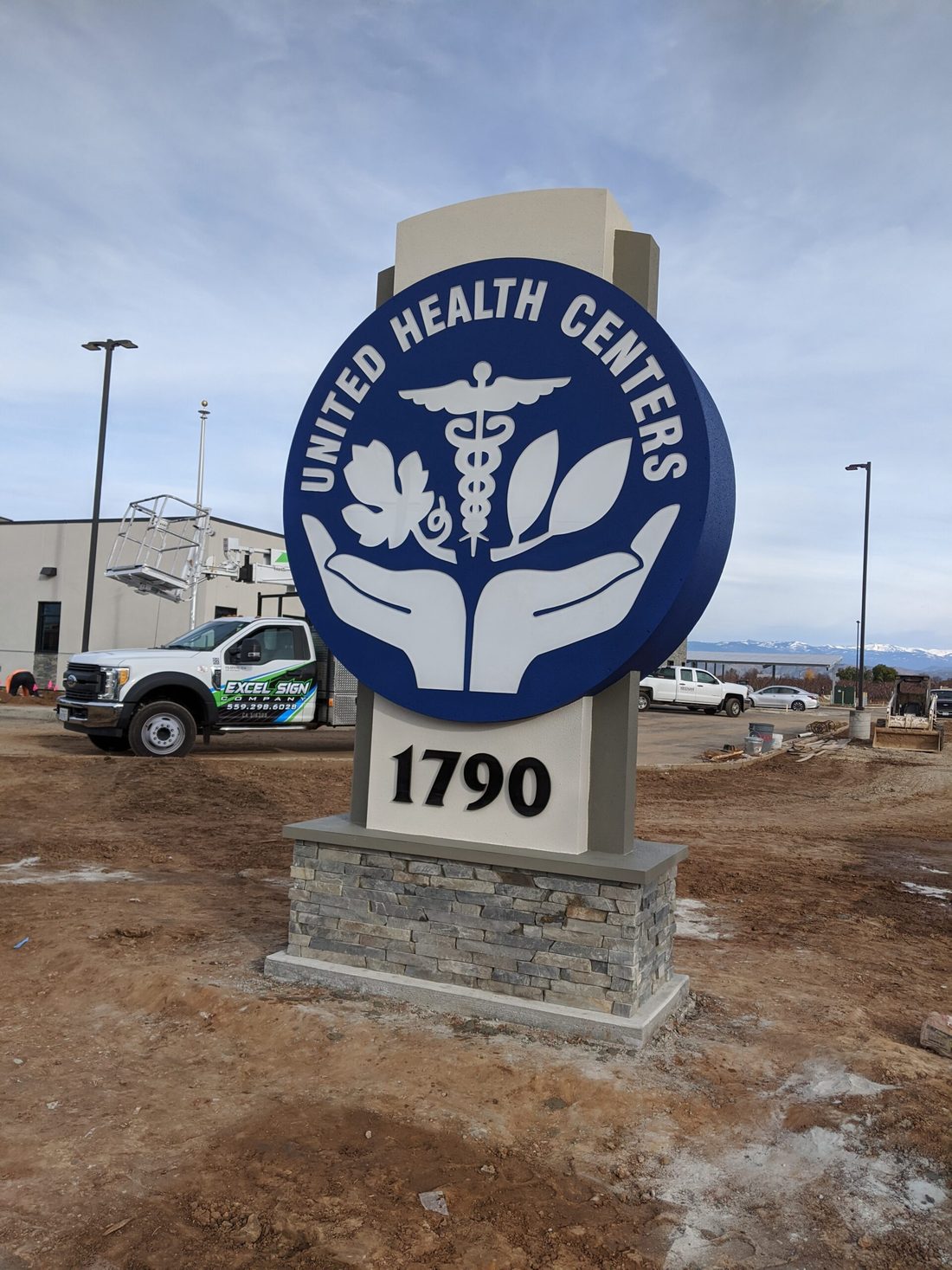 Low-profile monument sign at a Central Valley business entrance